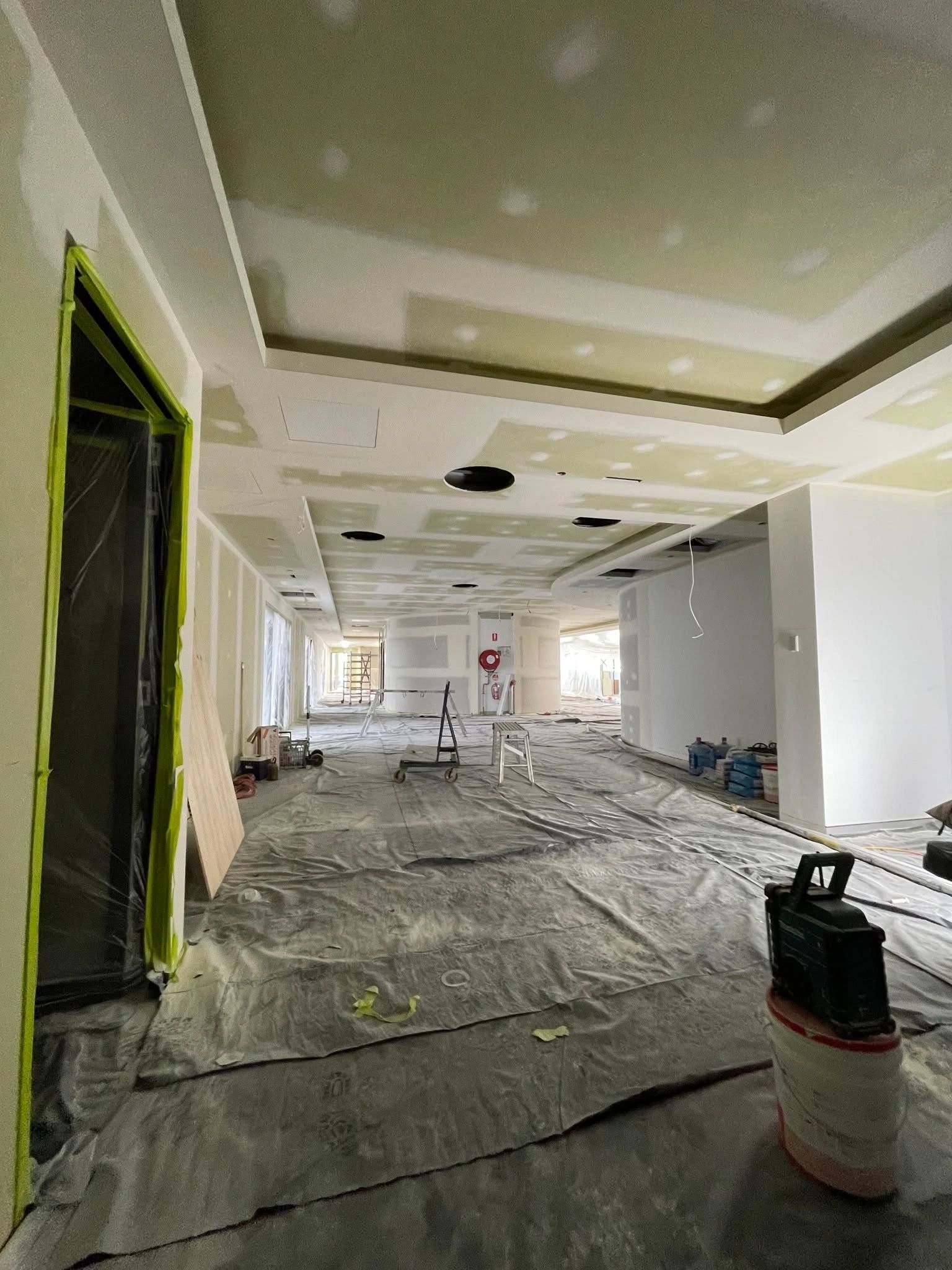 Plasterer at work on a commercial fit-out in Parklands
